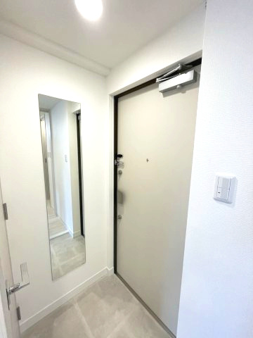 アドバンス上町台シュタットの玄関