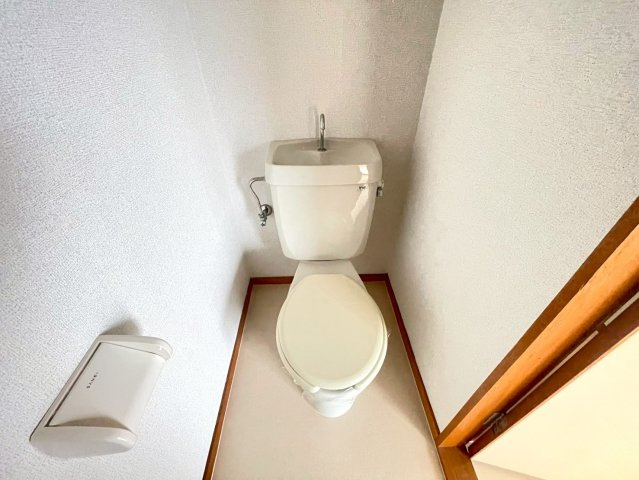 上郷町住居付店舗のトイレ