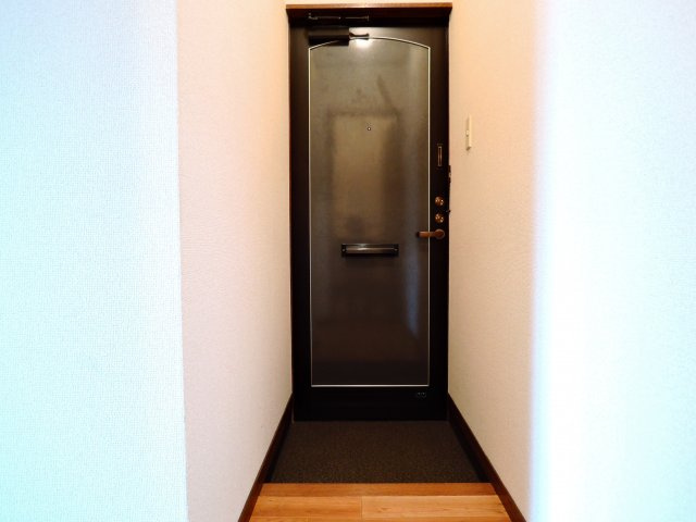 アーバンコート上牧の玄関