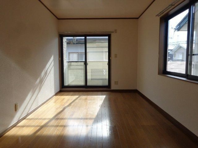 レジデンスまほろばＧ棟の洋室