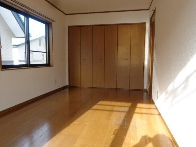 レジデンスまほろばＧ棟の洋室
