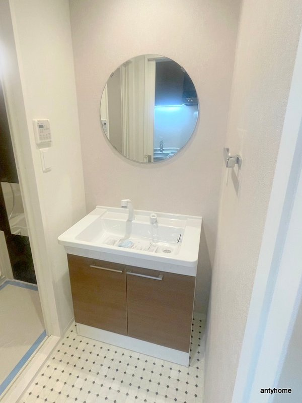 ブロード塚本駅前レジデンス　仲介手数料無料の洗面所