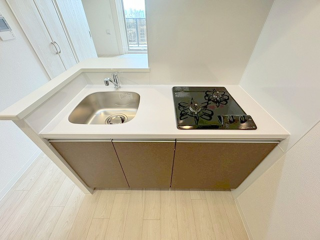 プレサンスNEO上新庄PRIMECRUISのキッチン