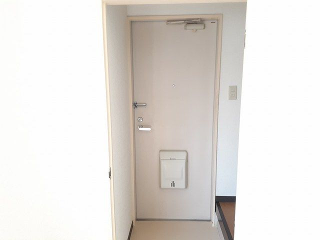 城見町アパ－ト付店舗Ⅰの玄関