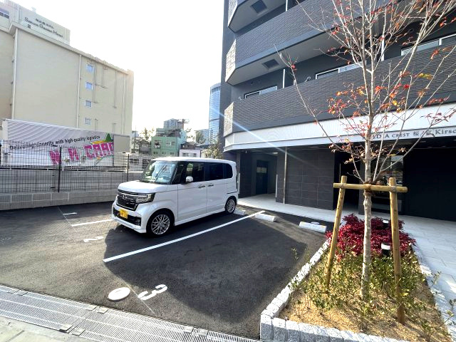 MELDIA CREST 桜ノ宮 Kirschの駐車場