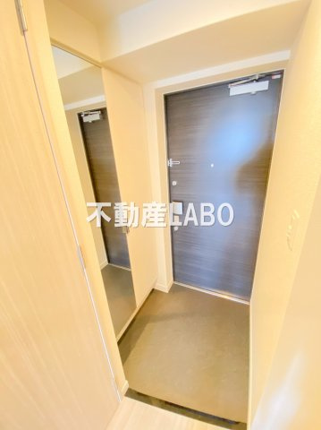 プレサンスOSAKA DOMECITY クロスティの玄関