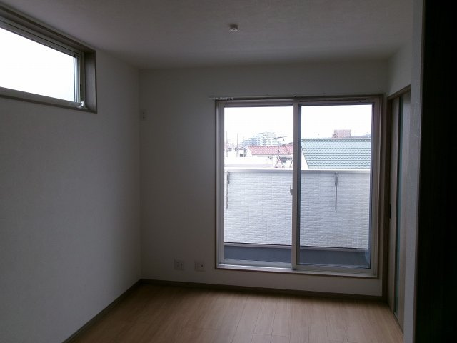 プレミアムソレイユ藤江駅前の洋室