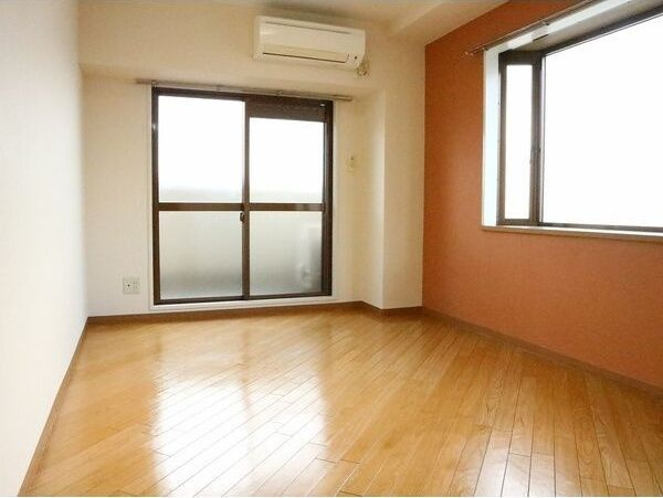 明和ハイツ南江口の洋室