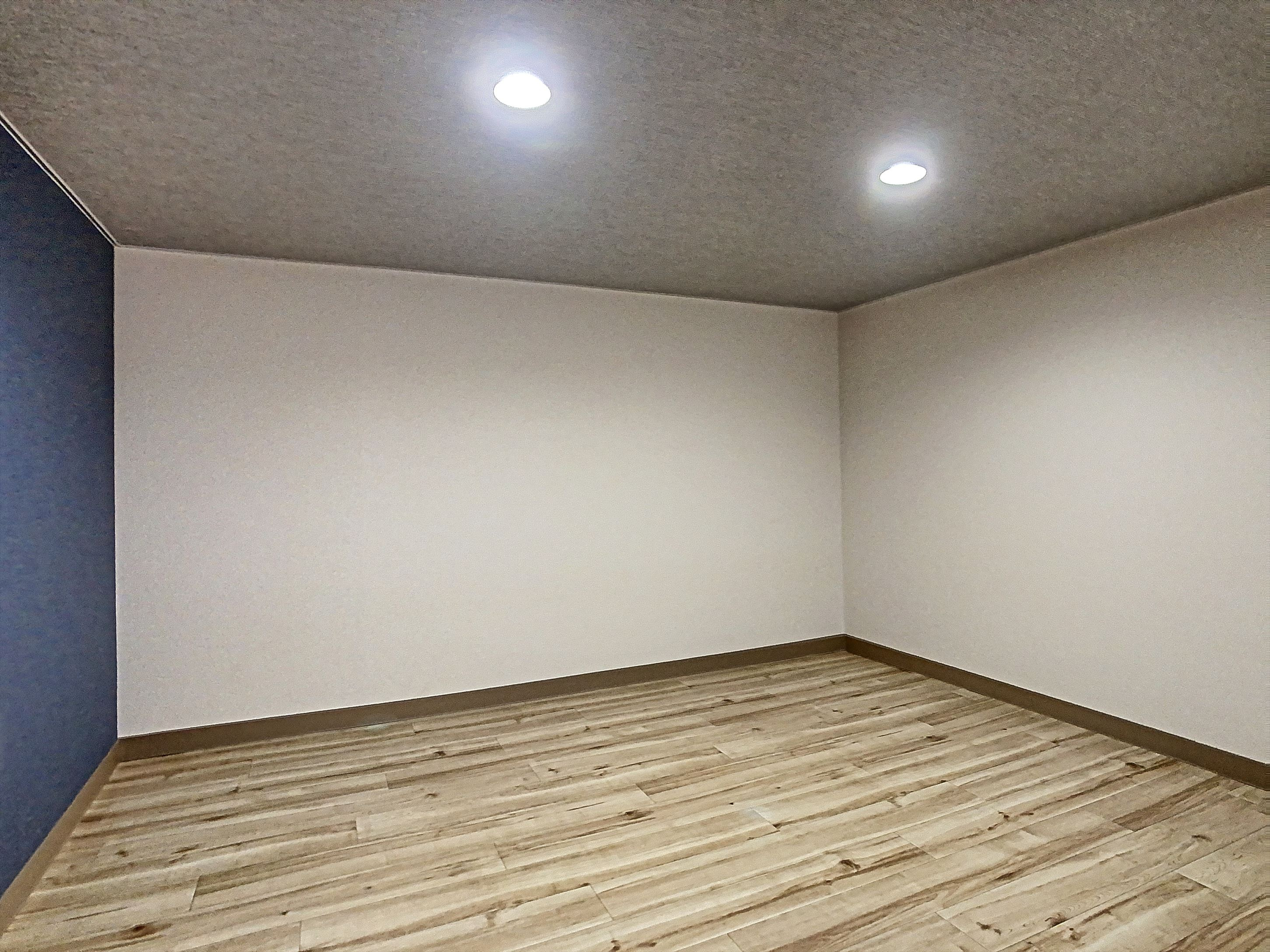 アップルハウス十日市の洋室