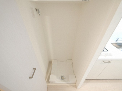 【設備】 | クレストタップ京橋 | 洗濯機置き場です