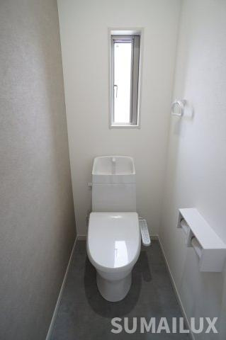 合志市豊岡の賃貸マンションのトイレ