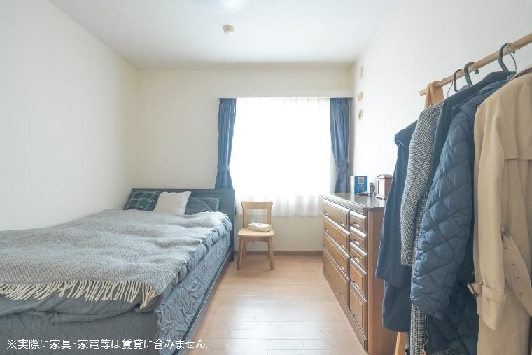 松原タウンホームの寝室