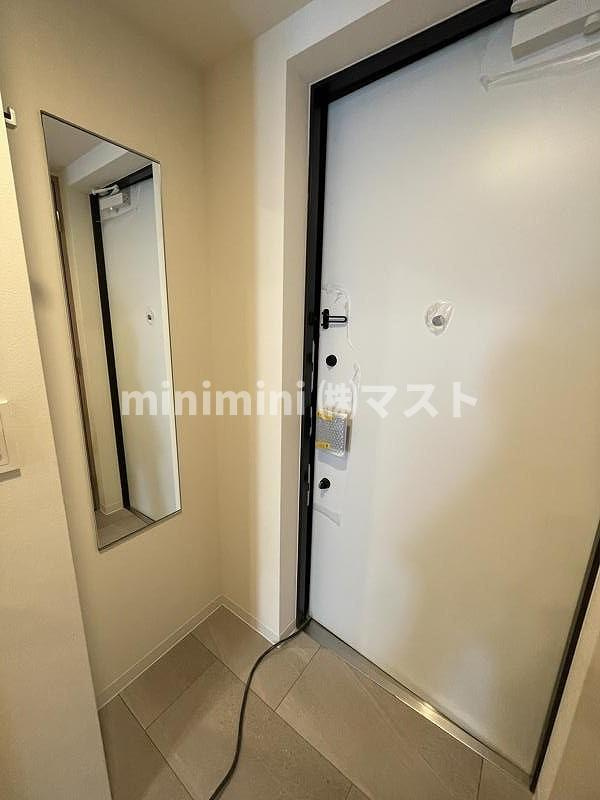 コンフォリア・リヴ本町WESTQの玄関