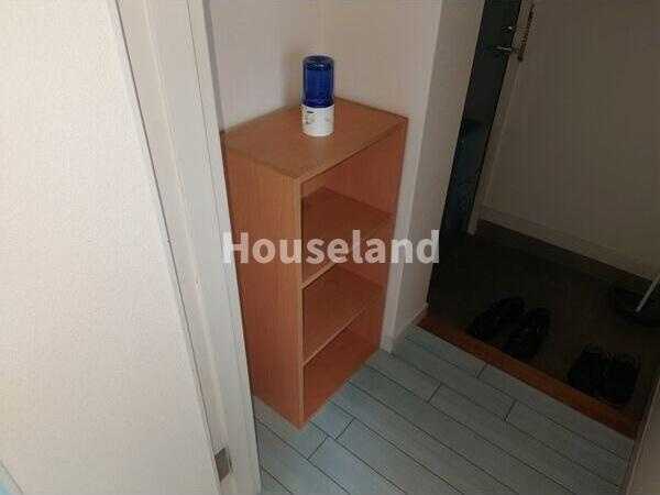 コスモ栄谷の玄関