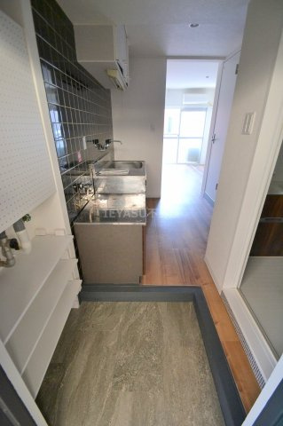 広島市西区小河内町２丁目の賃貸マンションの玄関