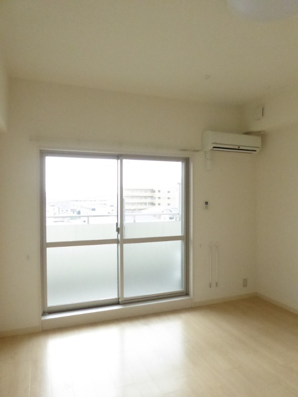 福富ＧＲＡＤＥマンションの居間・リビング