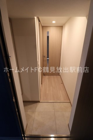 大阪市鶴見区茨田大宮４丁目の賃貸マンションの玄関
