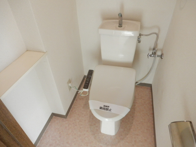 明石市松の内２丁目の賃貸マンションのトイレ