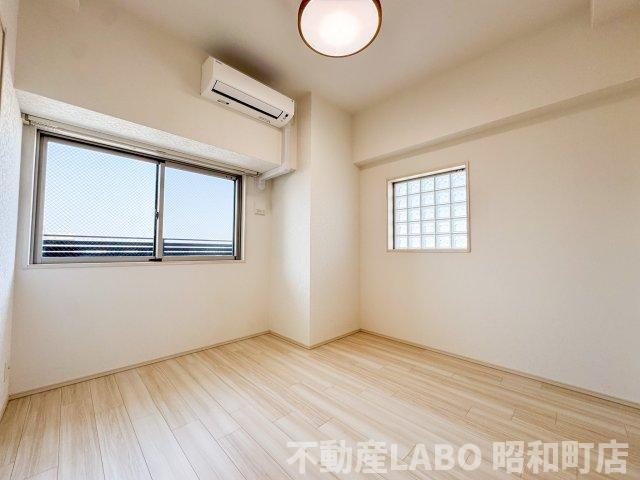 プレジオ帝塚山の洋室