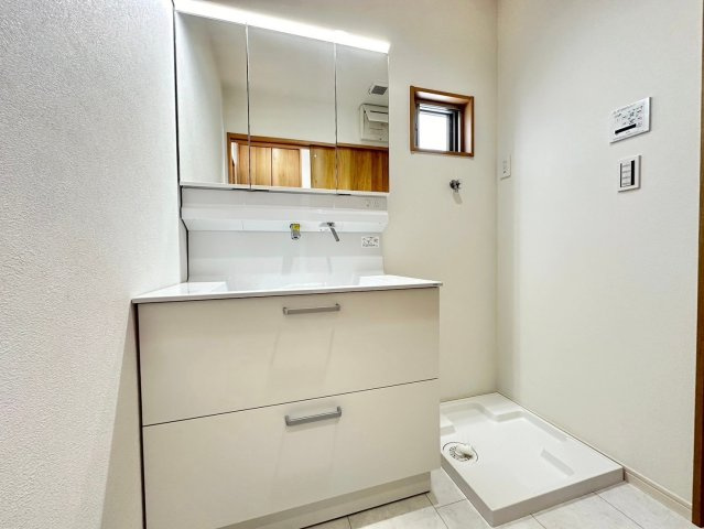 京都市西京区山田南山田町　未入居物件の洗面所