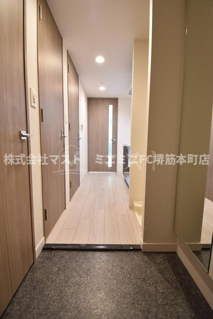 プレサンス谷町九丁目ディセオの玄関
