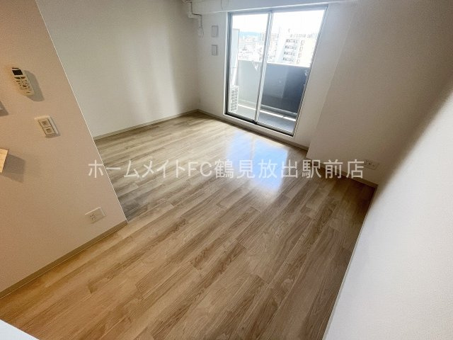 大阪市鶴見区鶴見４丁目の賃貸マンションの居間・リビング