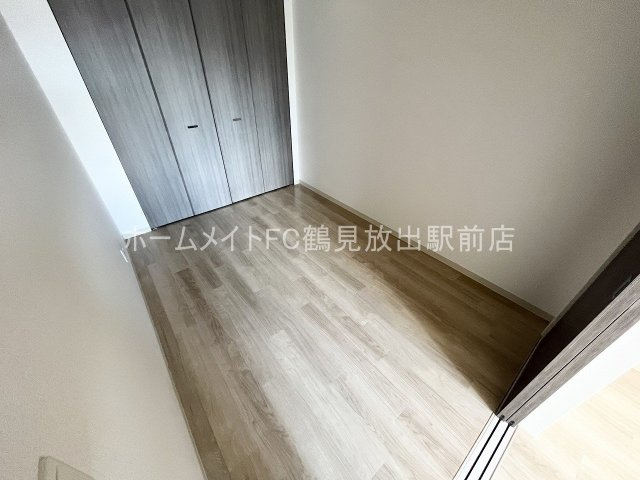 大阪市鶴見区鶴見４丁目の賃貸マンションの洋室