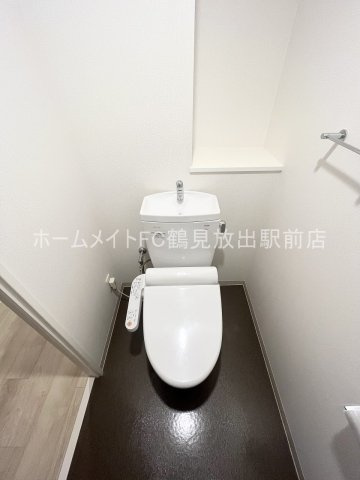大阪市鶴見区鶴見４丁目の賃貸マンションのトイレ