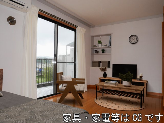 豊岡市塩津町の賃貸マンションの居間・リビング