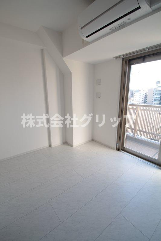 ハーモニーレジデンス横浜大通り公園EIRAKUの洋室