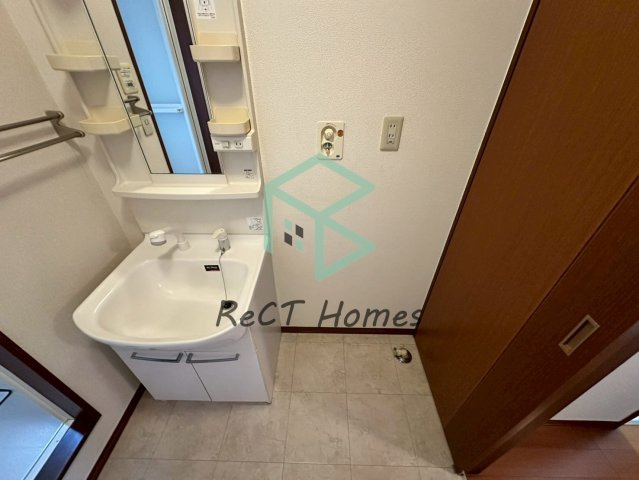 シャーメゾンTOMAMI　Ａ棟の洗面所