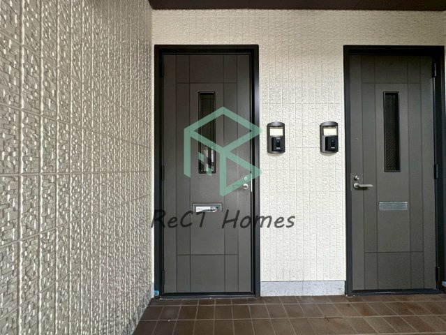 シャーメゾンTOMAMI　Ａ棟の玄関