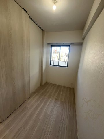 コンフォリア新大阪宮原Qの寝室
