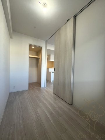 コンフォリア新大阪宮原Qの寝室