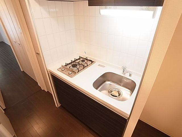 神戸市兵庫区新開地４丁目の賃貸マンションのキッチン|システムキッチン（ガス２口）