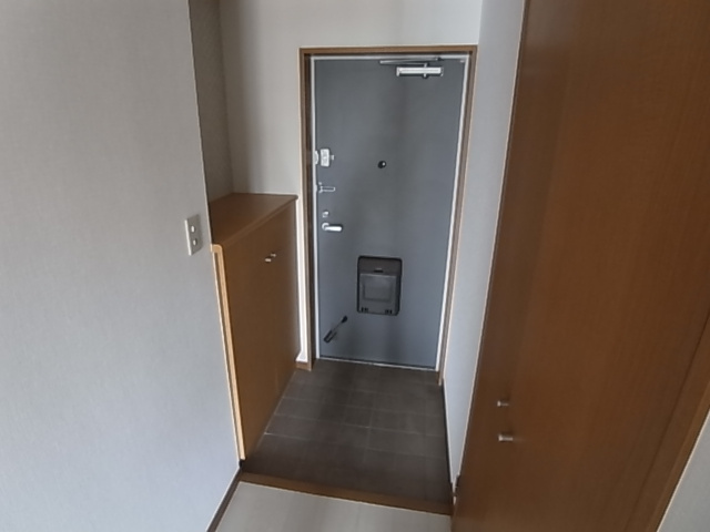 神戸市長田区六番町８丁目の賃貸マンションの玄関