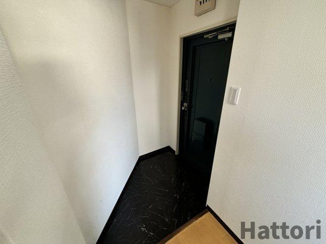 エレガンス中桜塚の玄関