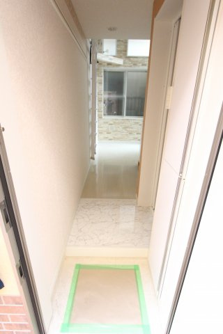 ユナイト保土ヶ谷エル・エスコリアルの玄関