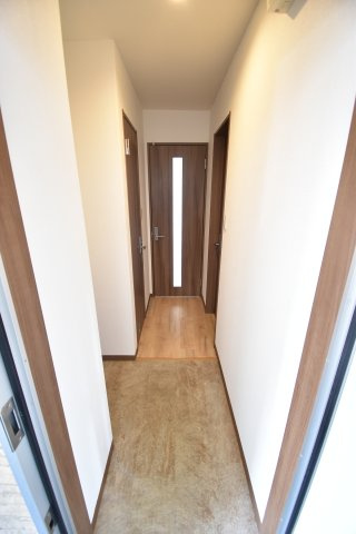 コンフォルト忍ケ丘の玄関