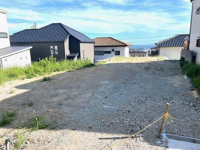 垂水区霞ヶ丘７丁目　売り土地の前面道路含む現地写真