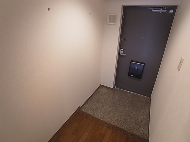 神戸市長田区長尾町２丁目の賃貸マンションの玄関