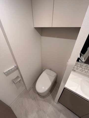 大阪市都島区都島北通１丁目の賃貸マンションのトイレ