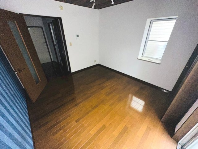 熊本市中央区黒髪３丁目の賃貸マンションの居間・リビング