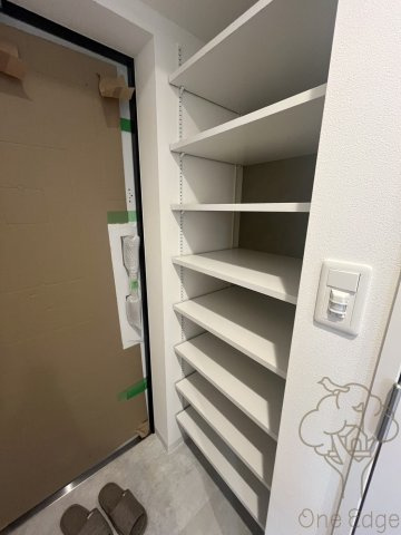 ブロード塚本駅前レジデンスの玄関