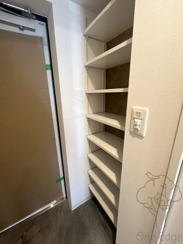 ブロード塚本駅前レジデンスの玄関