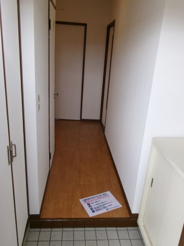 ルミエールSATOHの玄関