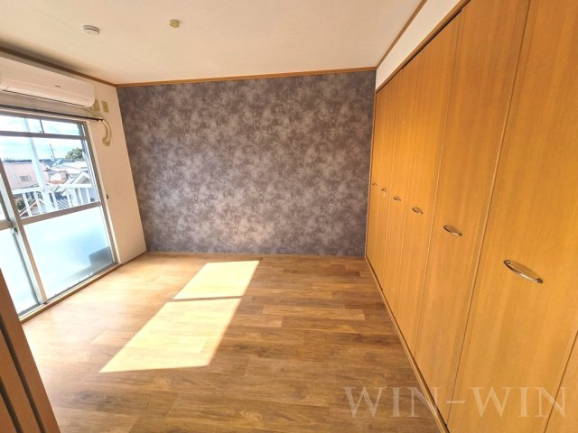 ハイツかつらの寝室