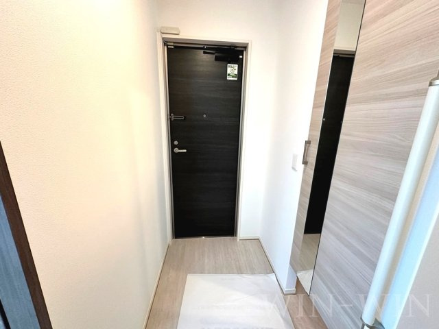 ファミール駅西の玄関