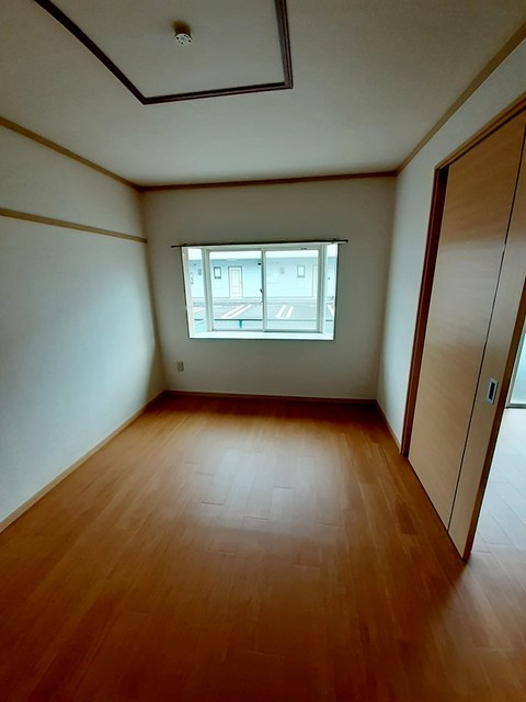 ホワイトルーム飯村 Dの寝室