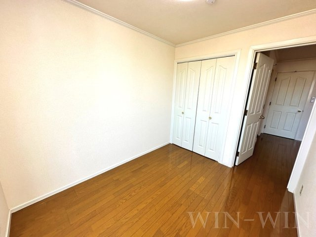 ホワイトタウン寺前の寝室